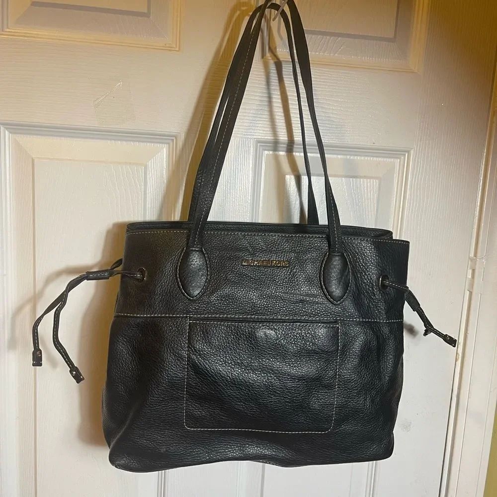 Michael Kors Black Leather Shoulder Bag with side drawstring gold tone hardwares